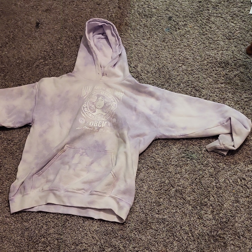 Medium OBEY worldwide purple with white with a design